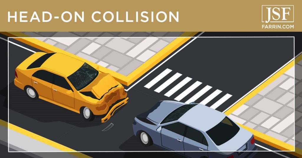 Head-on collision between two cars at an intersection.